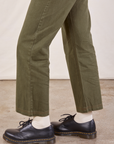 Work Pants in Surplus Green side view pant leg close up on Margaret