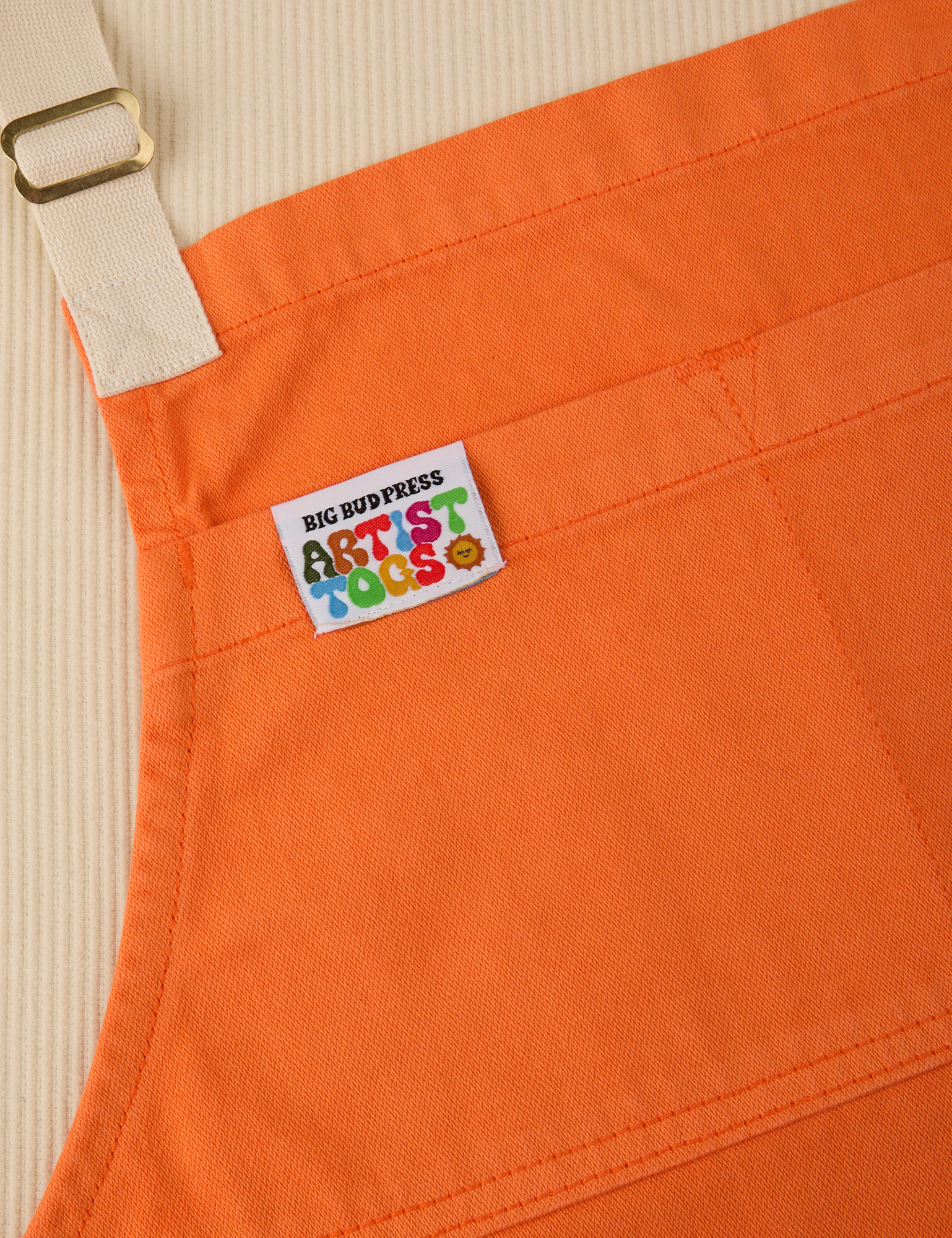 Full Denim Apron in Construction Orange close up