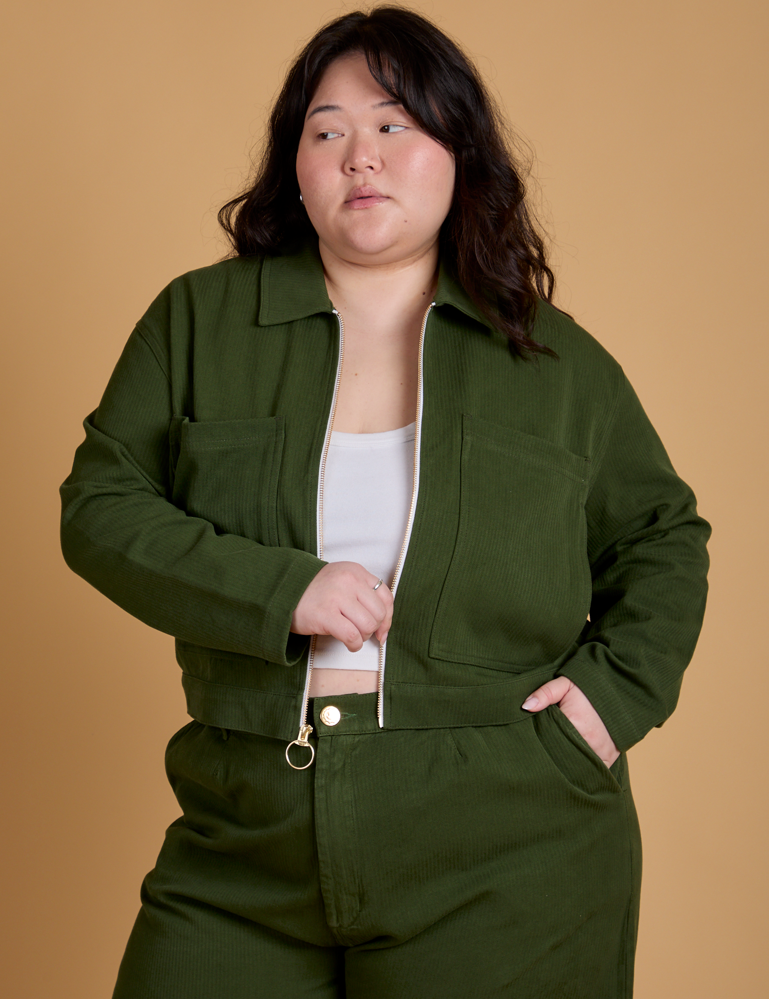 Ashley is 5’7” and wearing L Heritage Mechanic Jacket in Evergreen