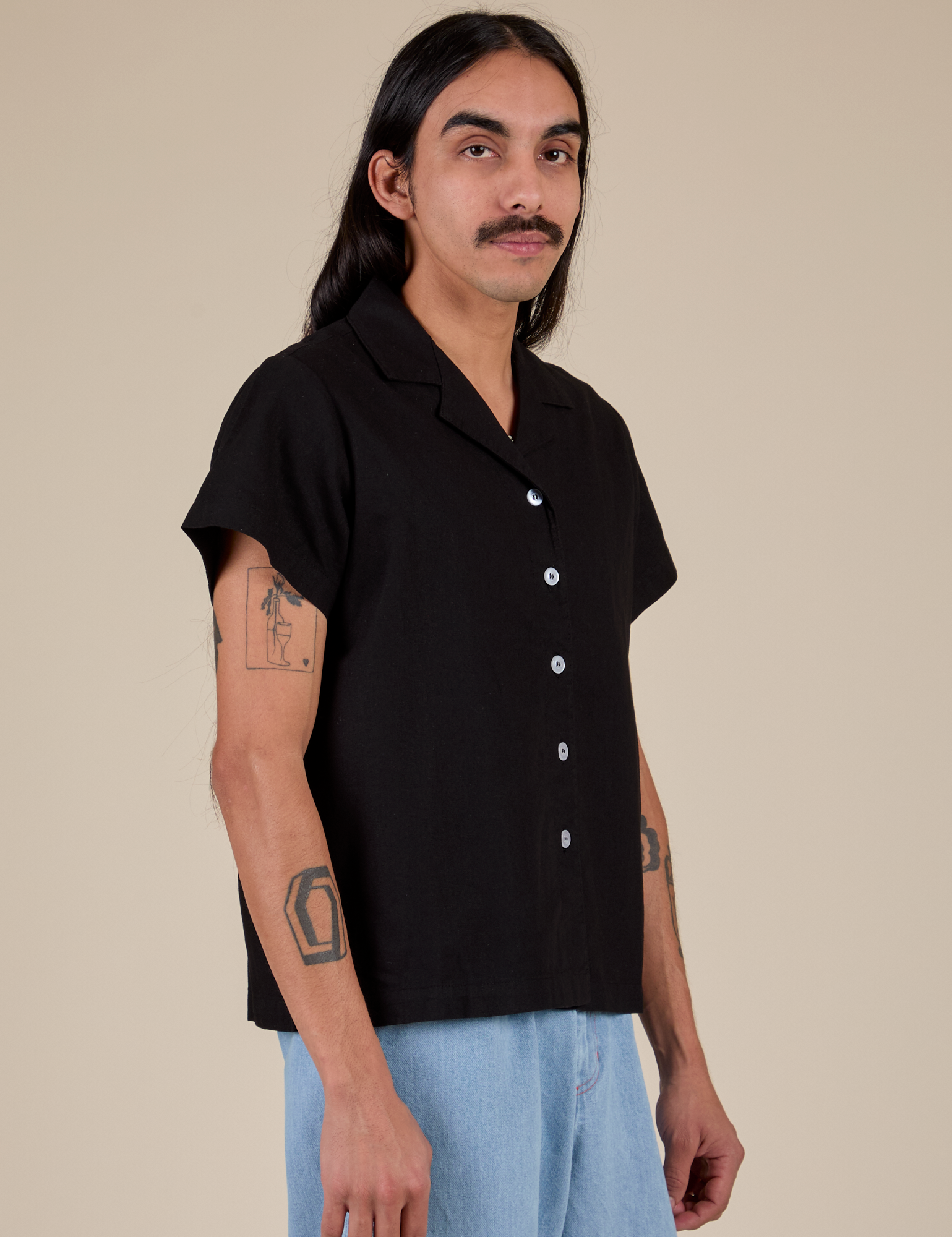 Pantry Button-Up in Basic Black angled front view on Anthony