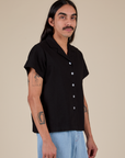 Pantry Button-Up in Basic Black angled front view on Anthony