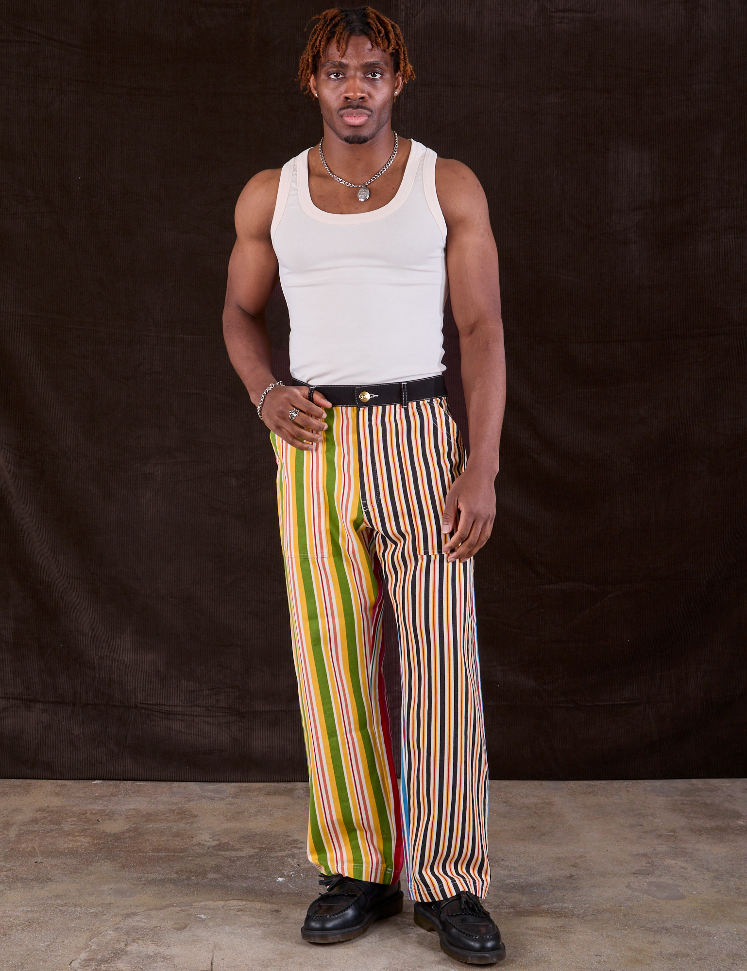 Isaac is 5&#39;10&quot; and wearing M Mixed Stripe Work Pants paired with a Tank Top in vintage tee off-white