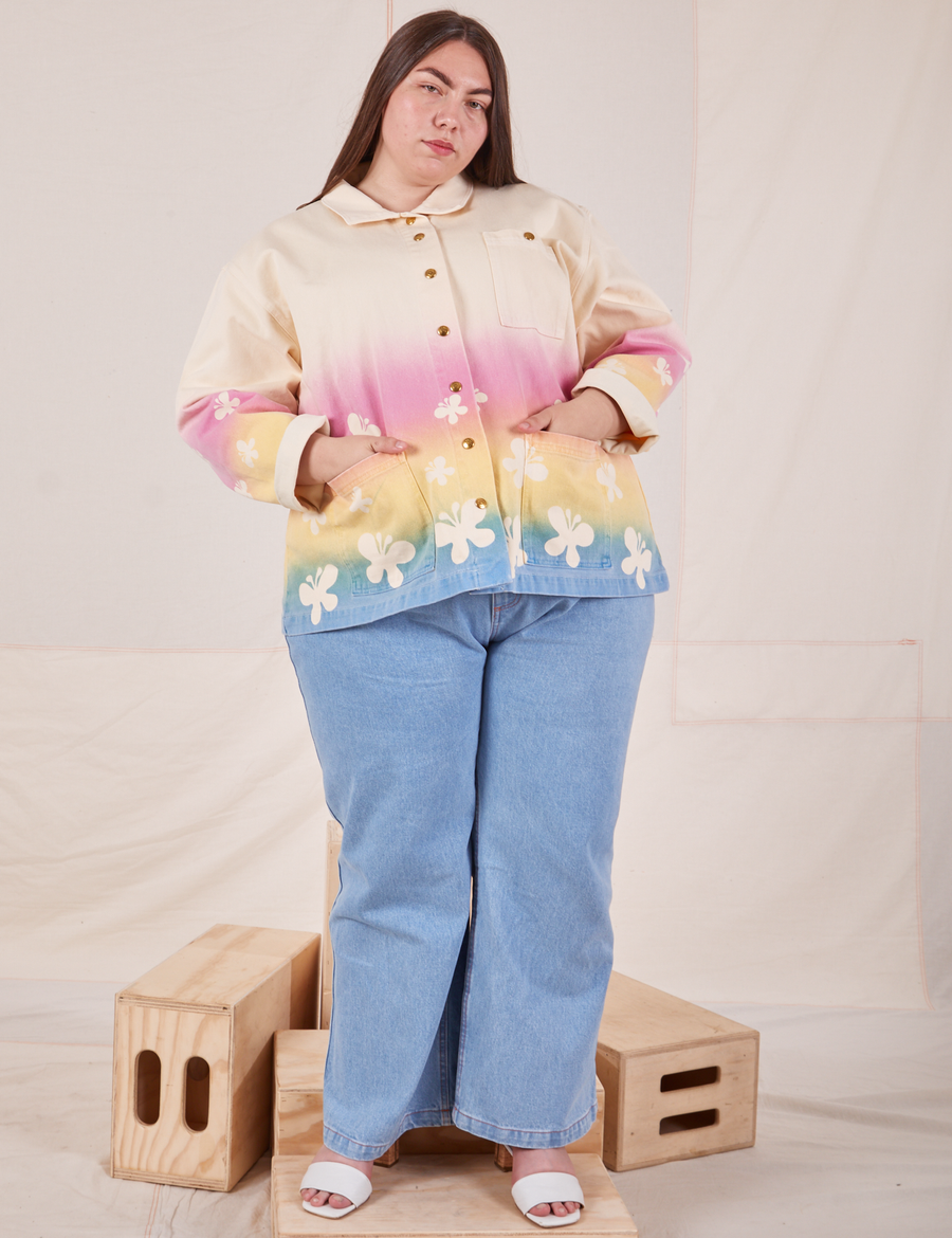 Marielena is wearing Work Jacket in Butterfly Airbrush paired with light wash Sailor Jeans