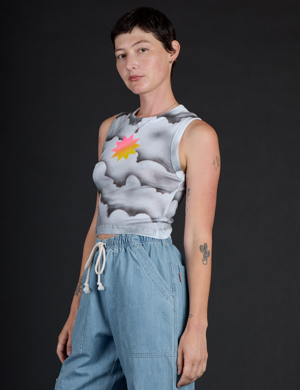 Angled side view of the Dark Cloud Airbrush Muscle Tee