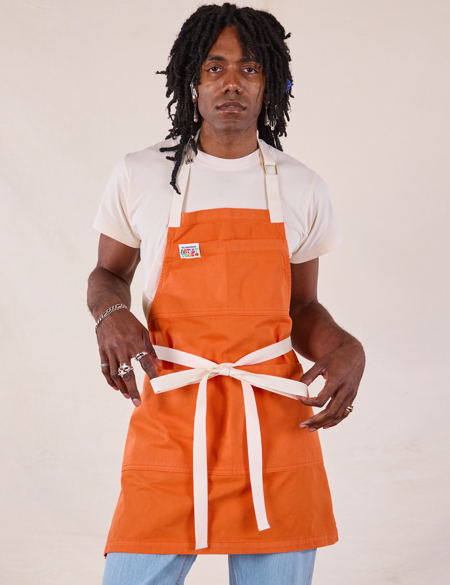 Full Denim Apron in Construction Orange worn by Jerrod