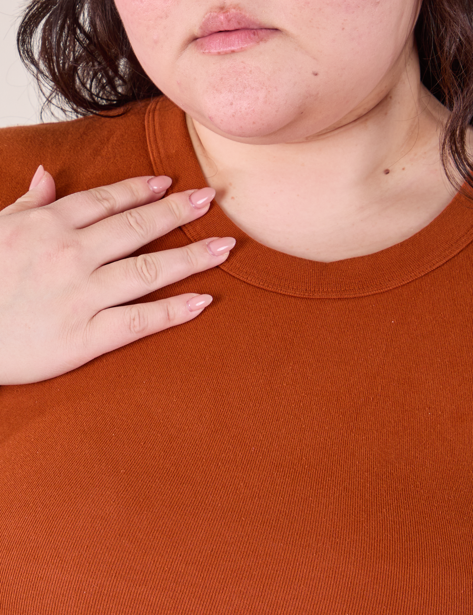 Baby Tee in Burnt Terracotta front close up on Ashley