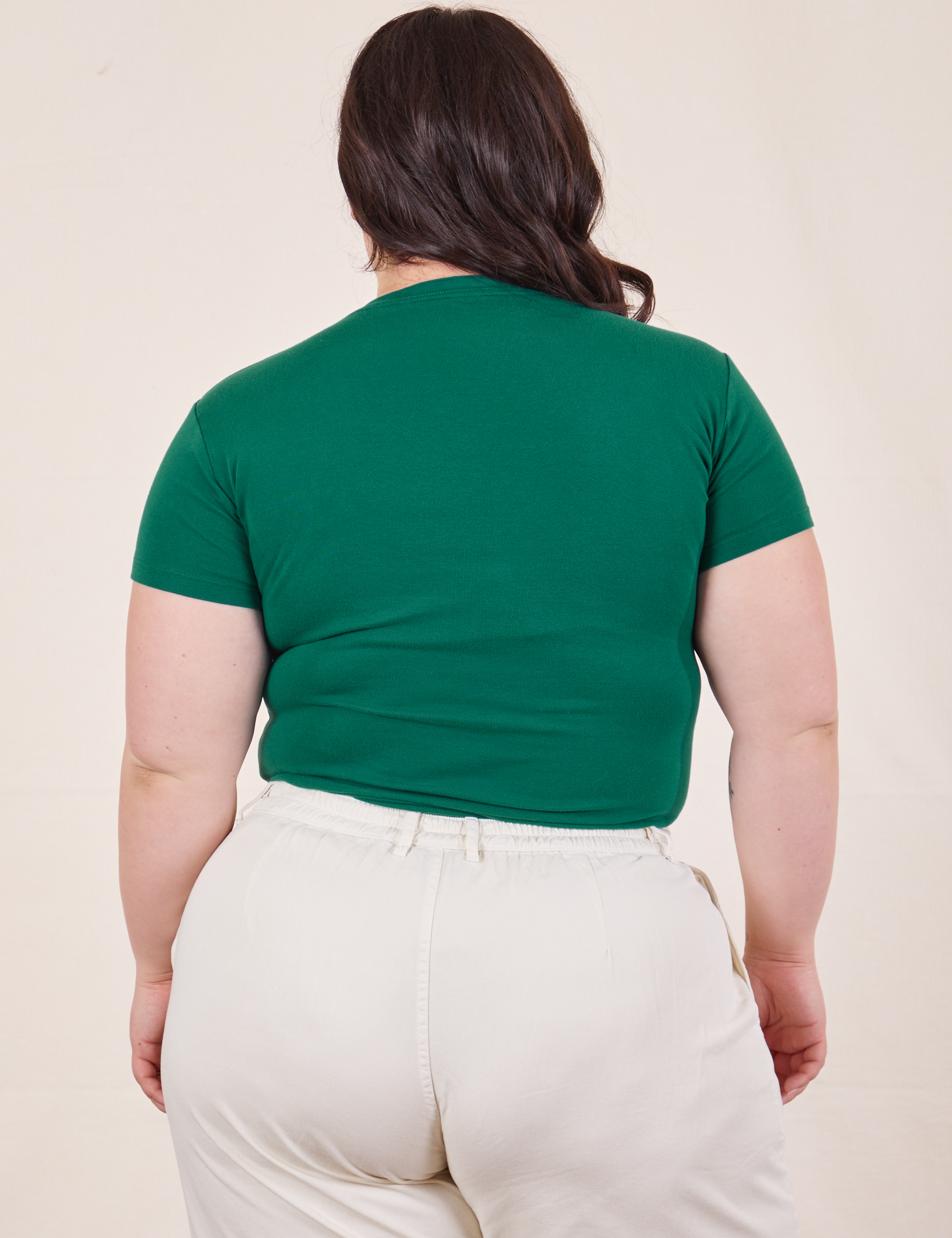 Back view of Baby Tee in Hunter Green worn by Ashley