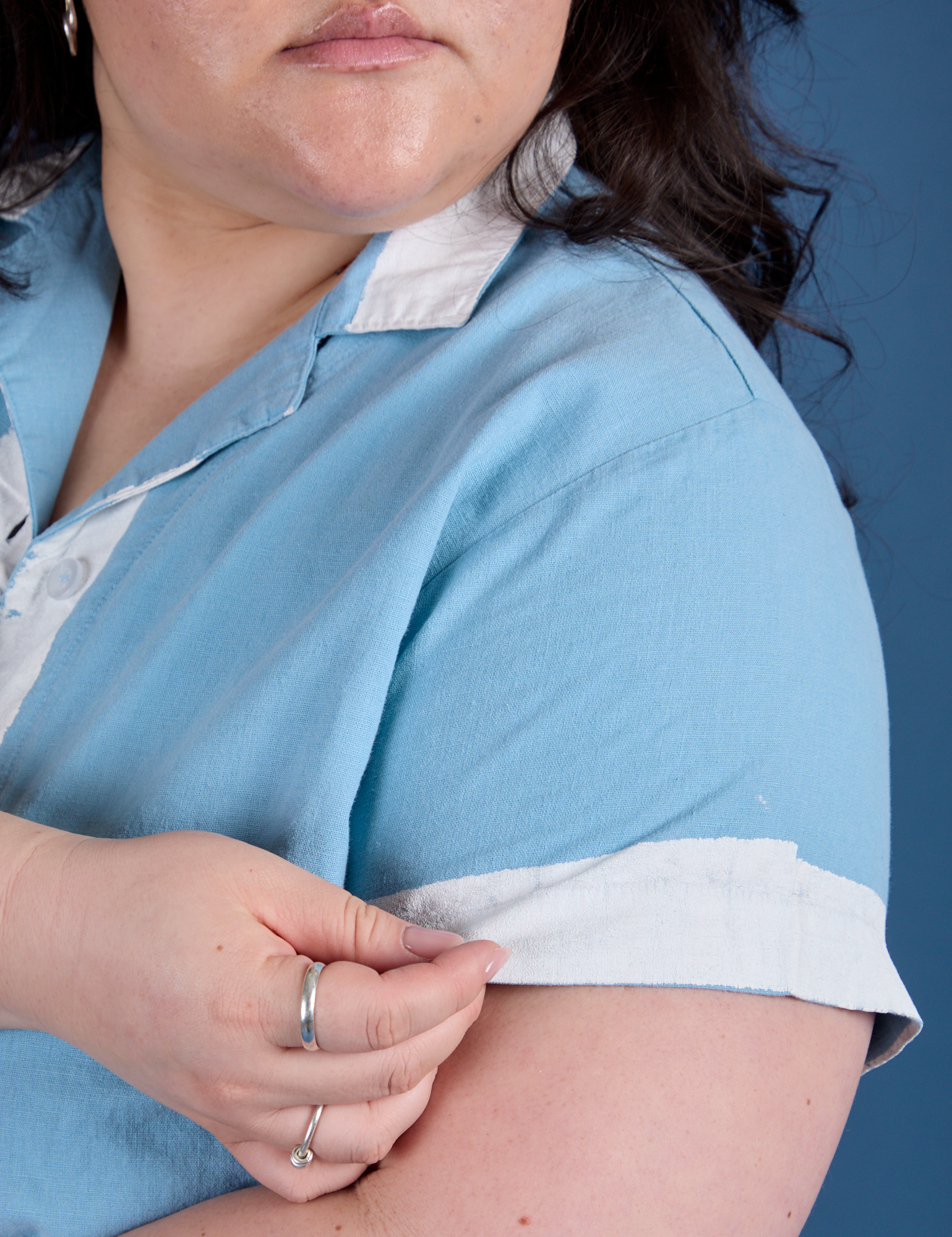 Close up of Painted Pantry Button-Up in Baby Blue sleeve