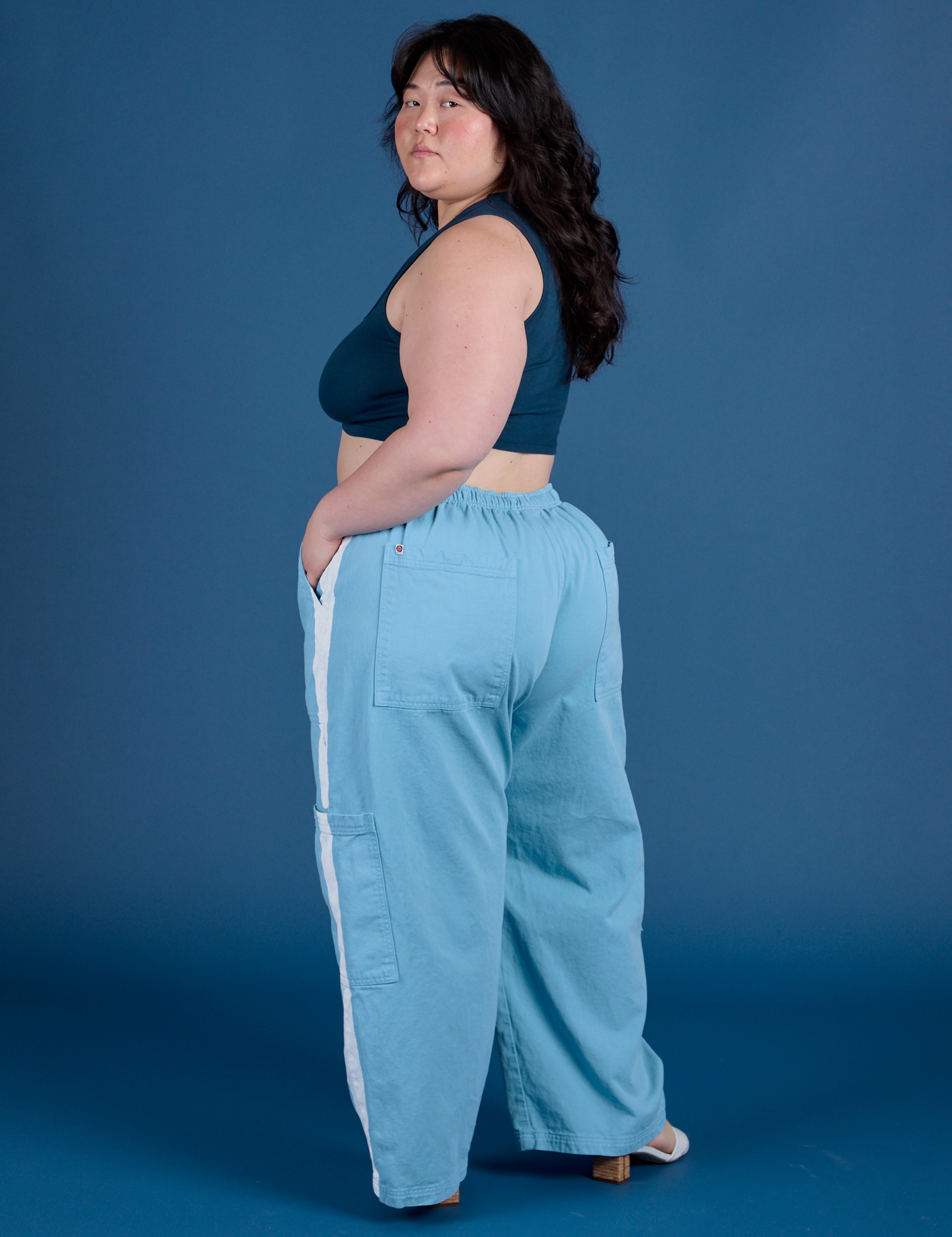 Painted Drop Pocket Cargo Pants in Baby Blue angled back view on Ashley