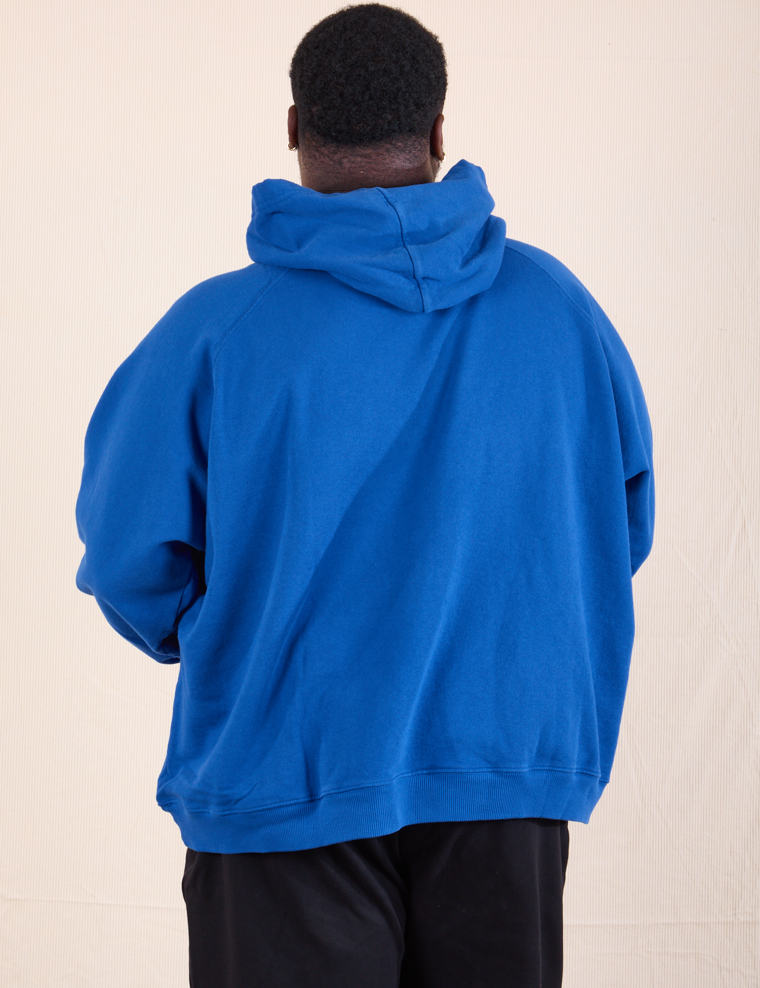 Oversized Hoodie in Royal Blue back view on Elijah