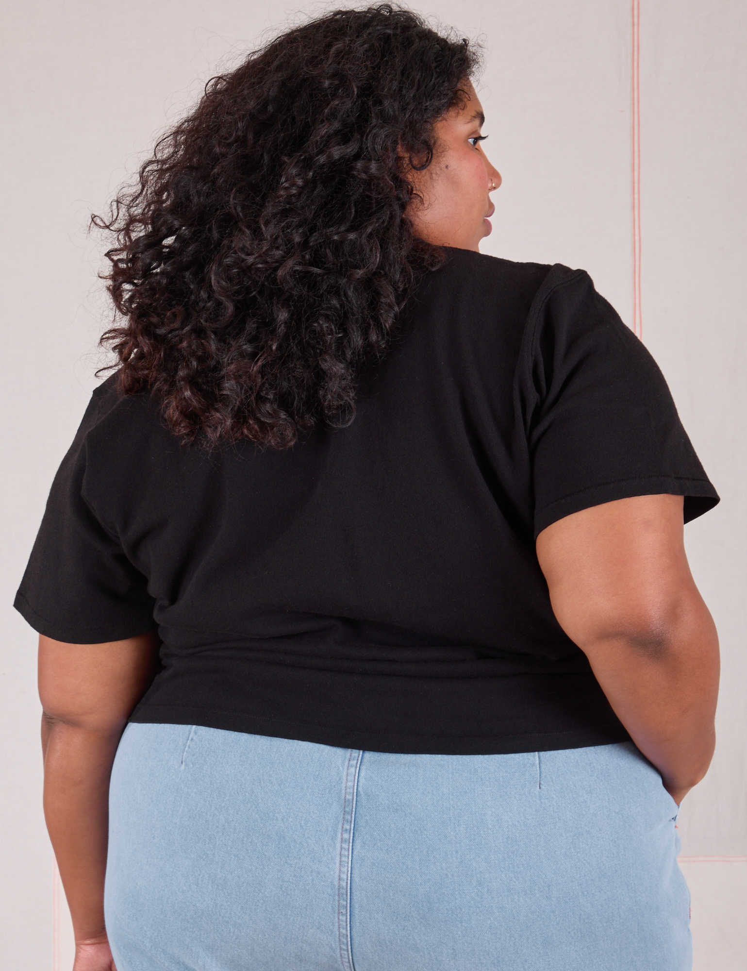 Burly Tee in Basic Black back view on Morgan