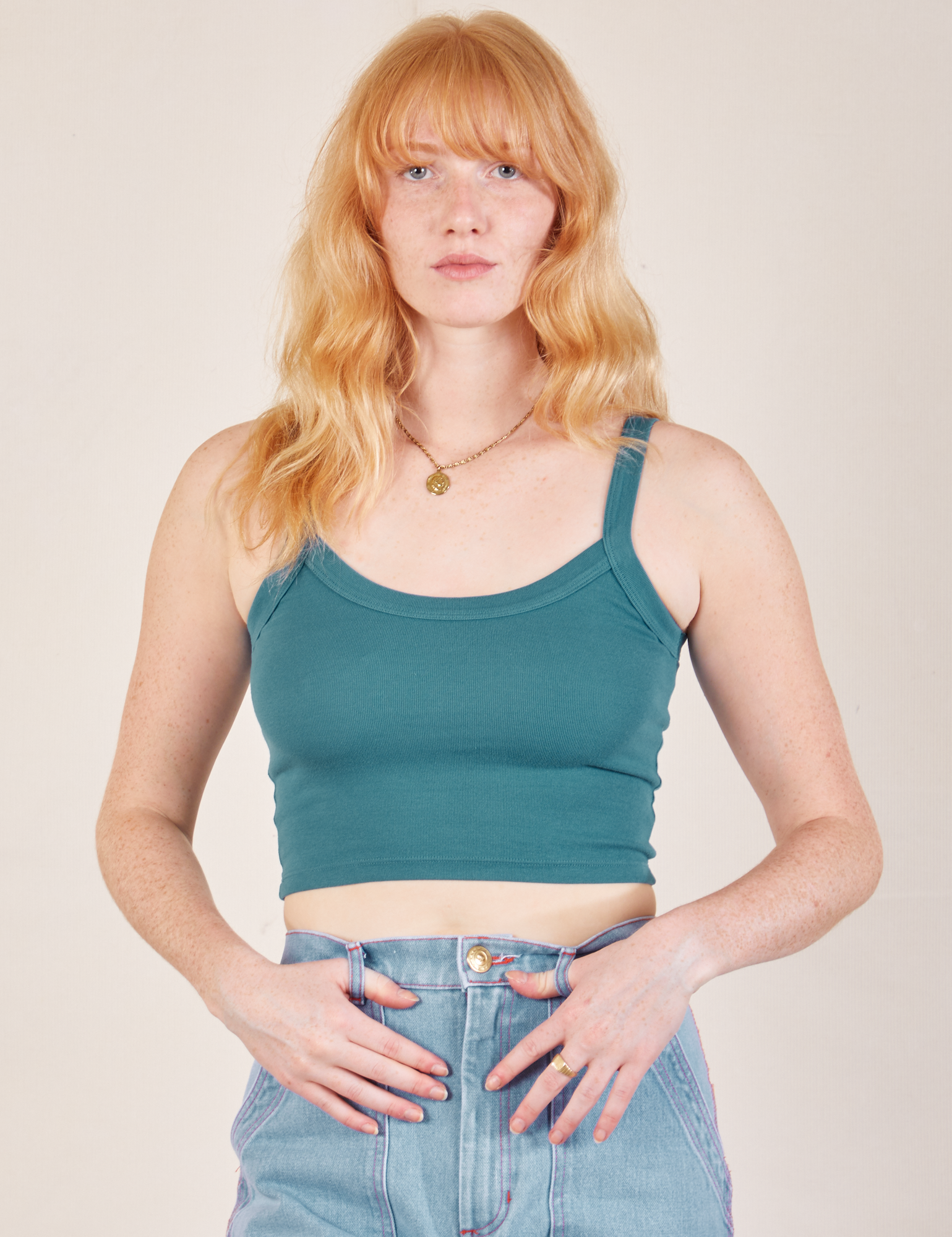 Margaret is 5’11” and wearing P Cropped Cami in Marine Blue