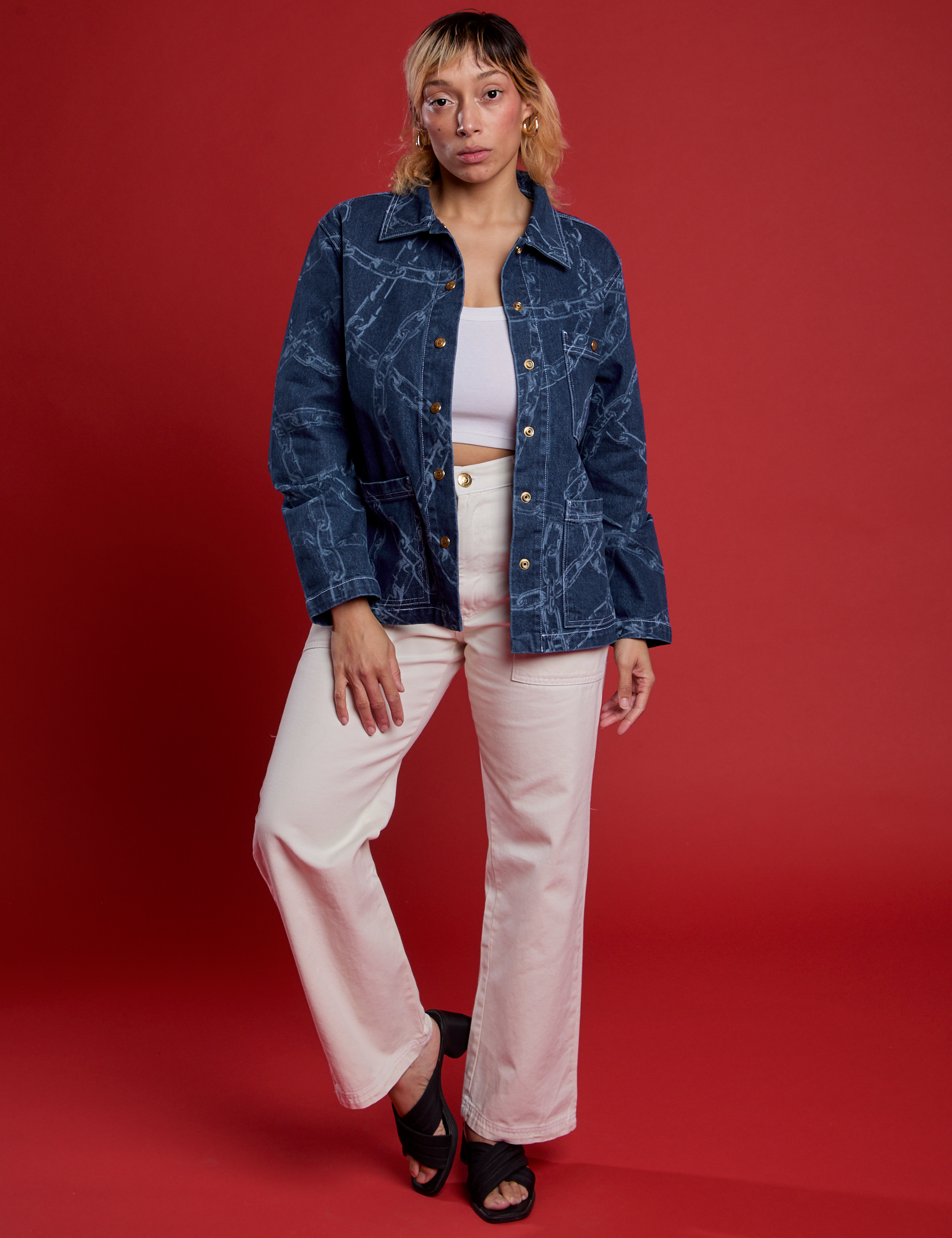 Tiara is 5’4” and wearing S Chain Link Work Jacket paired with White Cami and White Work Pants