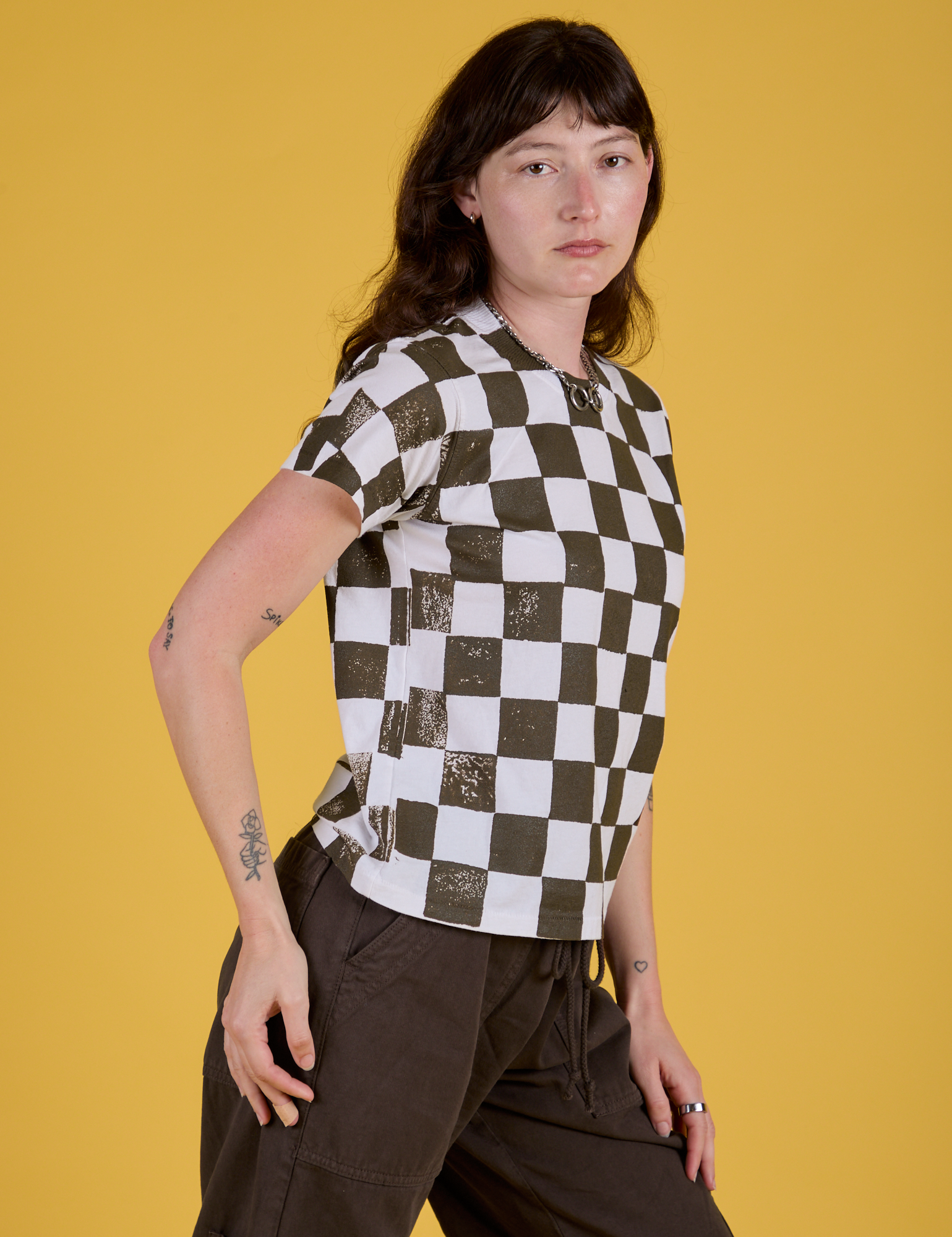 Checker Organic Tee in Espresso Brown side view on Alex