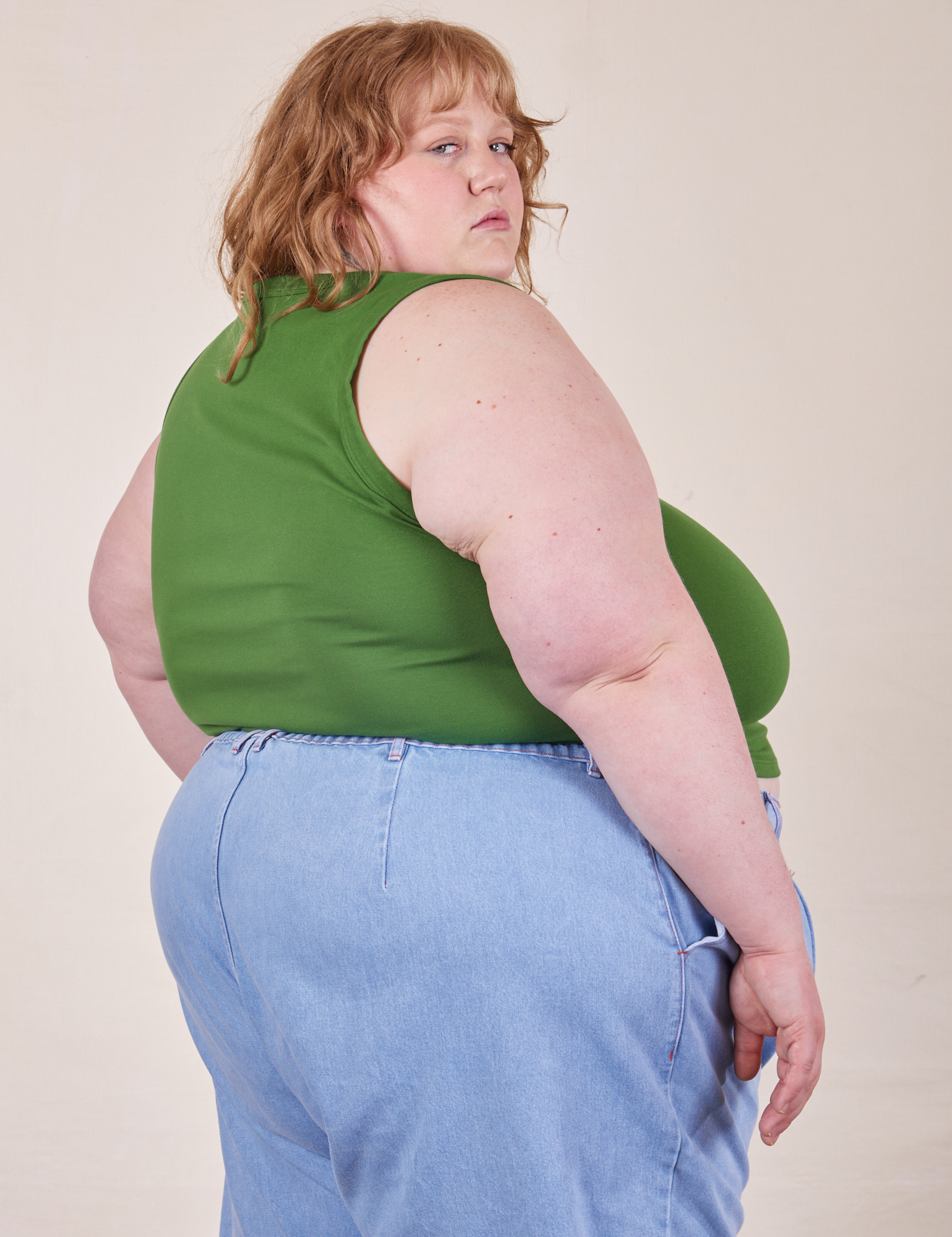 Side view of Cropped Tank Top in Lawn Green worn by Catie