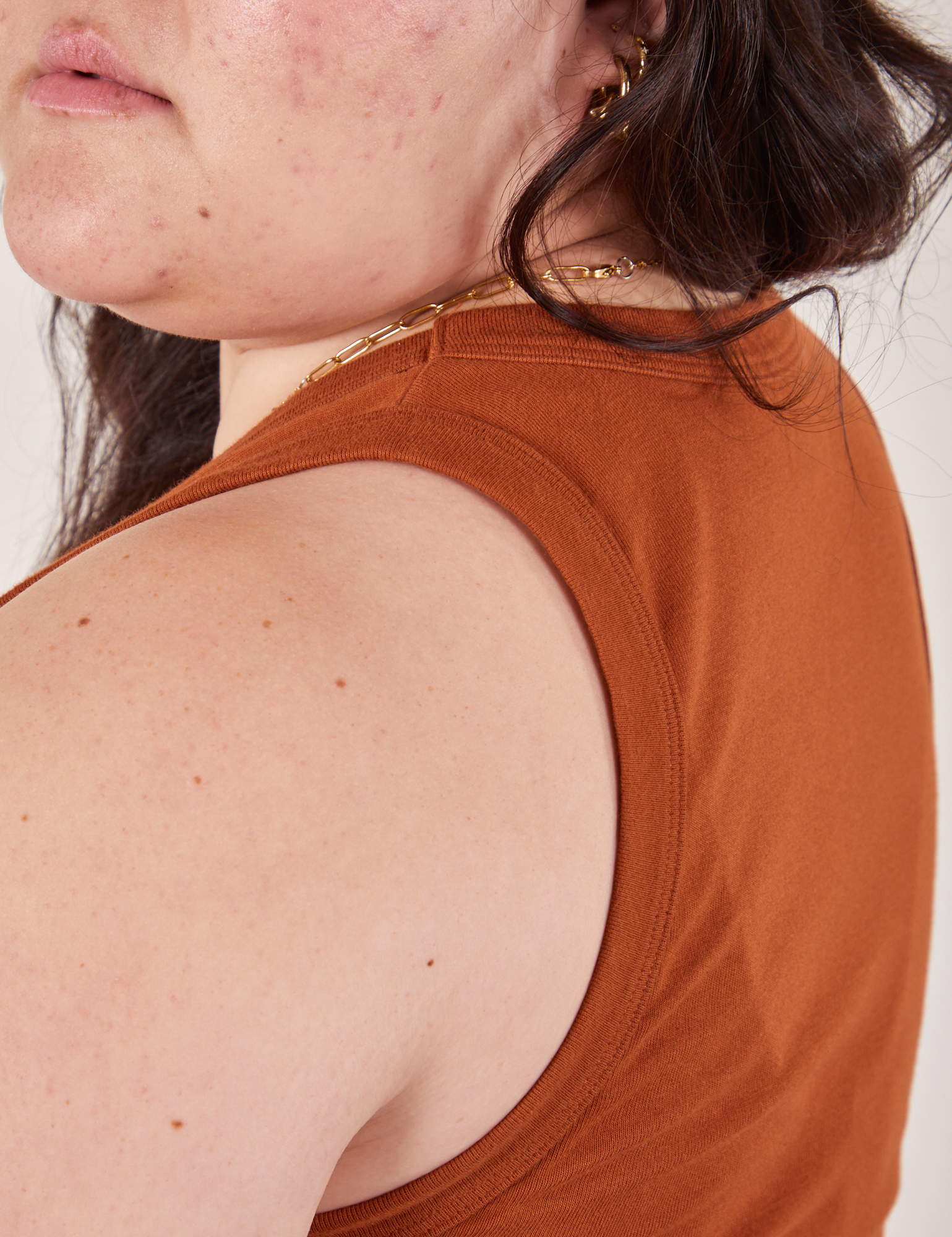 Cropped Tank Top in Burnt Terracotta side shoulder close up on Ashley