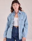 Alex is wearing Denim Overshirt in Light Wash with a Cropped Cami in Vintage Tee Off-White underneath