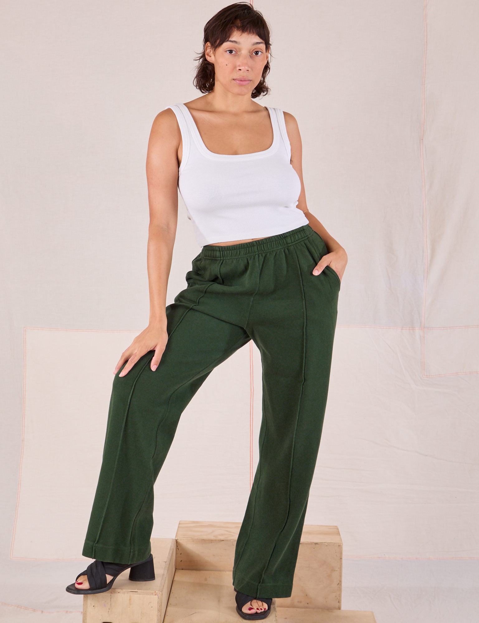 Tiara is 5&#39;4&quot; and wearing S Easy Western Pants in Swamp Green