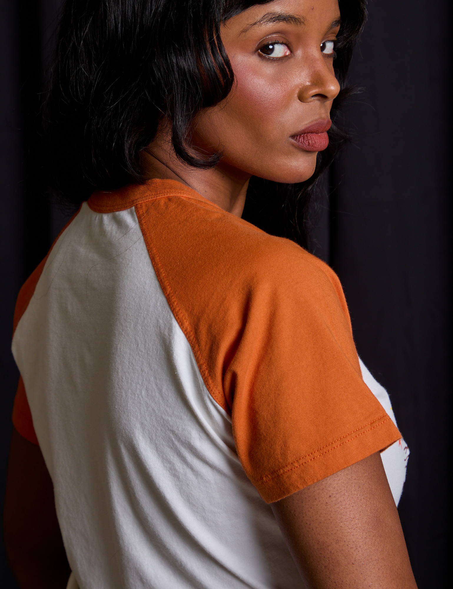 Short Sleeve Raglan Tee in Haunted House shoulder close up
