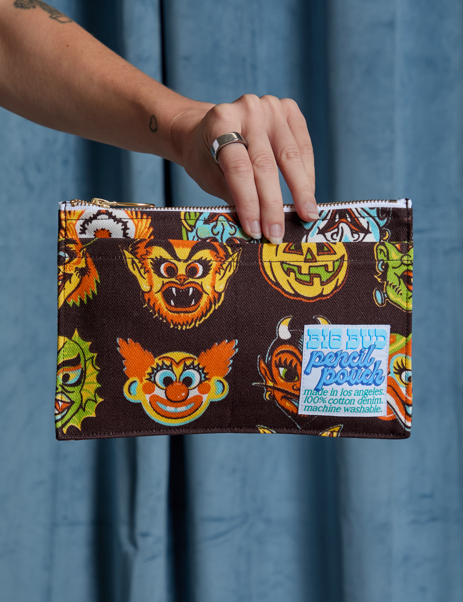 Halloween Masks Pencil Pouch held by model