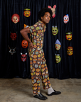 Short Sleeve Jumpsuit in Halloween Masks side view on Jerrod