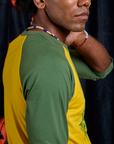 Side shoulder close up of Raglan Tee in Creature on Jerrod