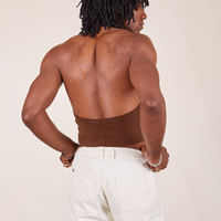 Back view of Halter Top in Fudgesicle Brown and vintage off-white Western Pants worn by Jerrod
