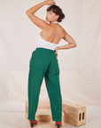 Back view of Heavyweight Trousers in Hunter Green and vintage off-white Halter Top