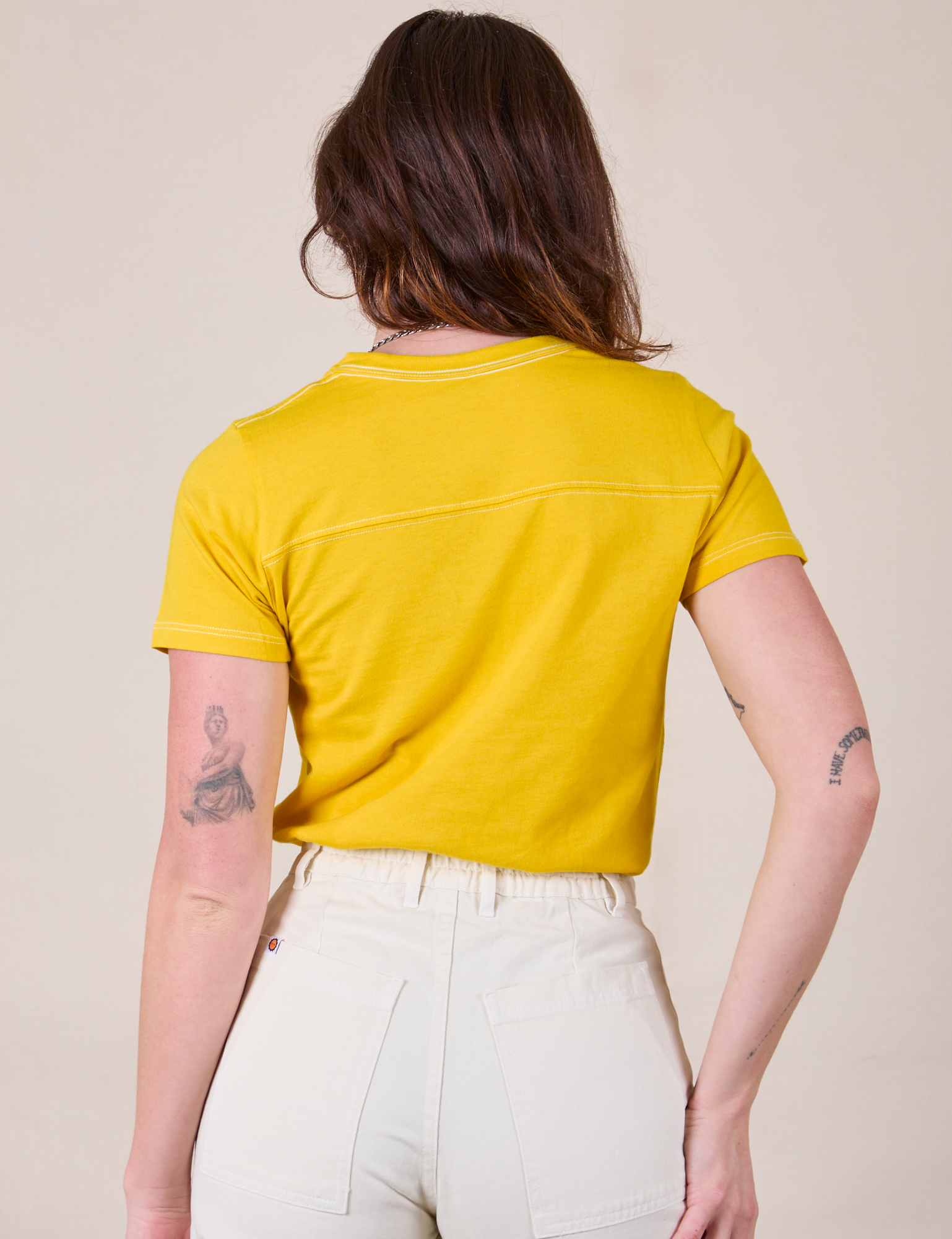 JV Tee in Golden Yellow back view on Alex