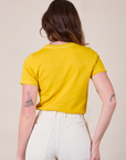 JV Tee in Golden Yellow back view on Alex