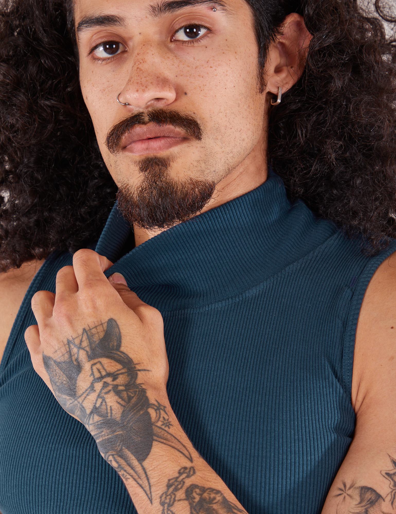 Sleeveless Essential Turtleneck in Lagoon front close up on Jesse