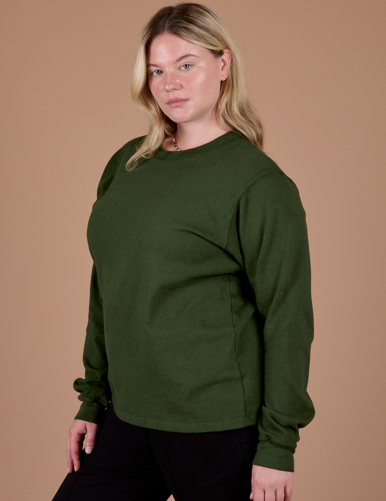 Long Sleeve Burly Tee in Evergreen angled front view on Lish