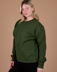 Long Sleeve Burly Tee in Evergreen angled front view on Lish