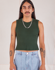 Anthony is 5’10” and wearing S Muscle Tee in Swamp Green