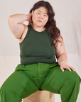 Ashley is wearing Racerback Tank in Swamp Green and lawn green Trousers