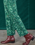 Side view pant leg close up of Marble Splatter Work Pants in Hunter Green on Jesse