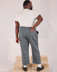 Back view of Mid-Rise Work Pants in Slate Grey and Organic Vintage Tee in vintage tee off-white on Elijah