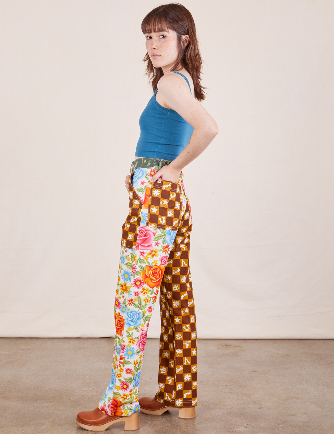 Side view of Mismatched Print Work Pants and marine blue Cropped Cami worn by Hana