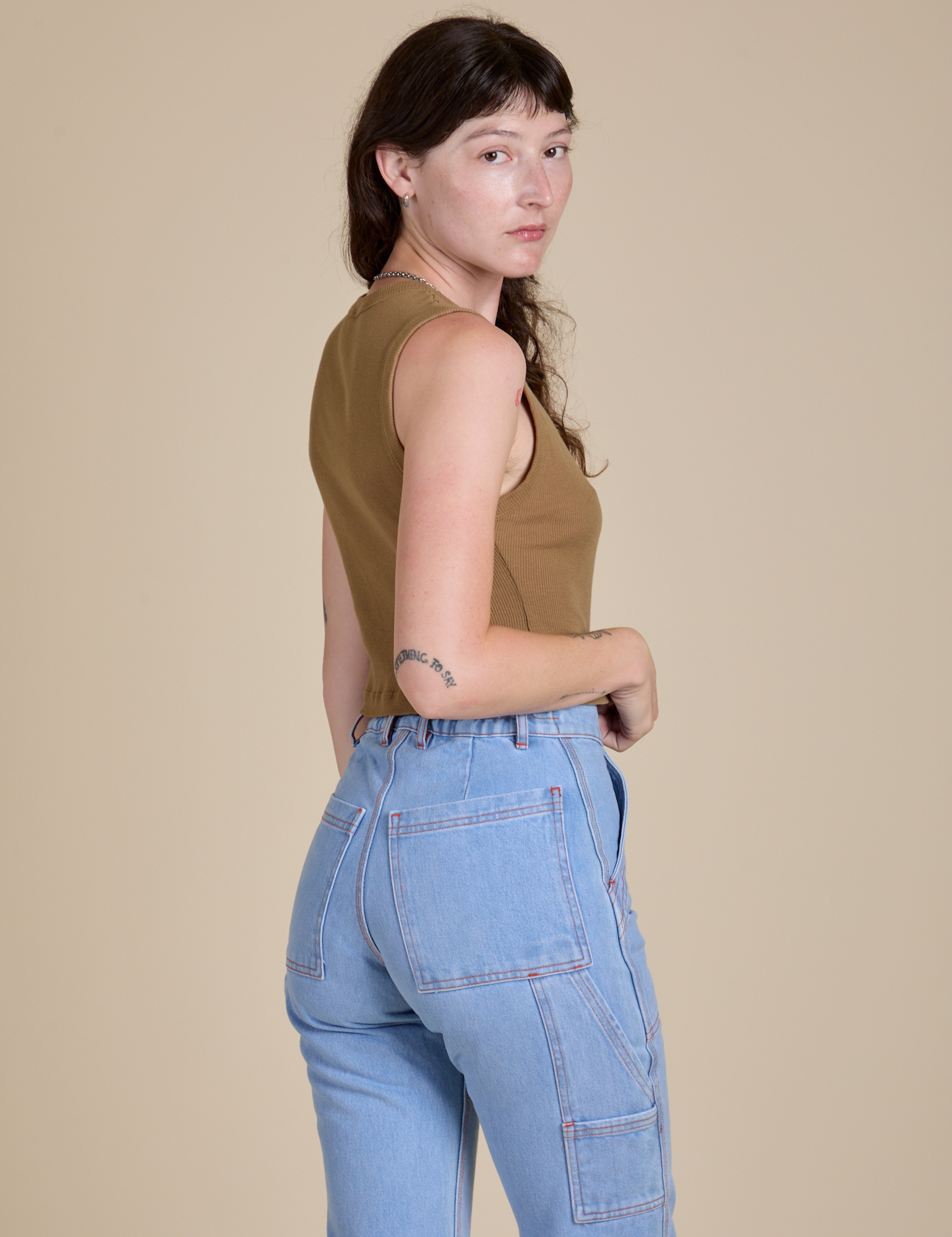 Muscle Tee in Desert Brown side view on Alex