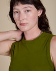 Front close up of Muscle Tee in Summer Olive on Alex
