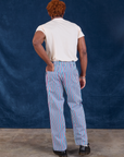 Back view of Stripe Work Pants in Blue Raspberry and Organic Vintage Tee in vintage tee off-white on Issac