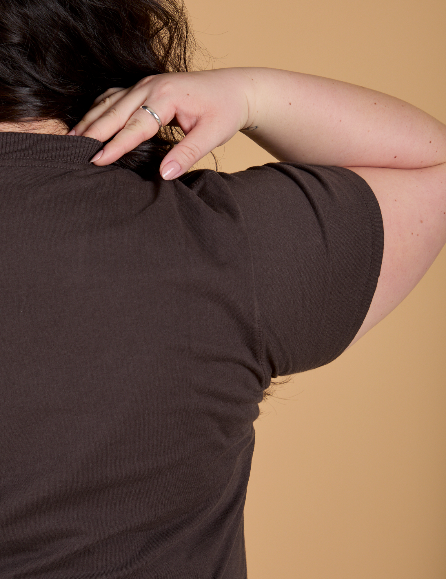 Back shoulder close up of Organic Vintage Tee in Espresso Brown on Ashley