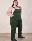 Original Overalls in Swamp Green angled front view on Marielena