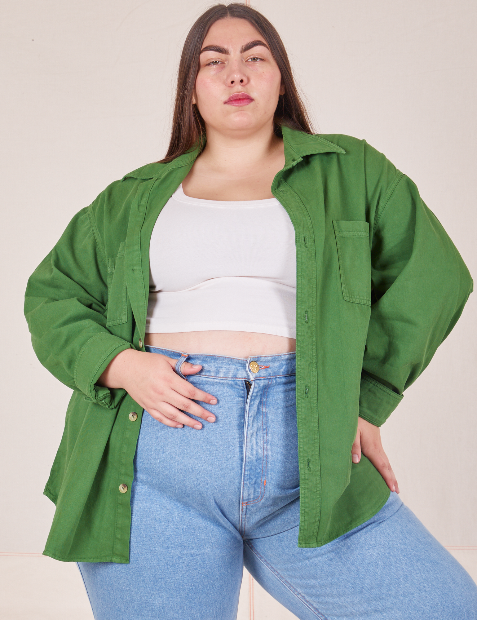 Marielena is wearing size 0XL Oversize Overshirt in Lawn Green paired with vintage off-white Cropped Tank Top