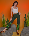 Alex is 5'8" and wearing XXS Paintstamped Work Pants in Cactus paired with a Cropped Tank in Vintage Tee White