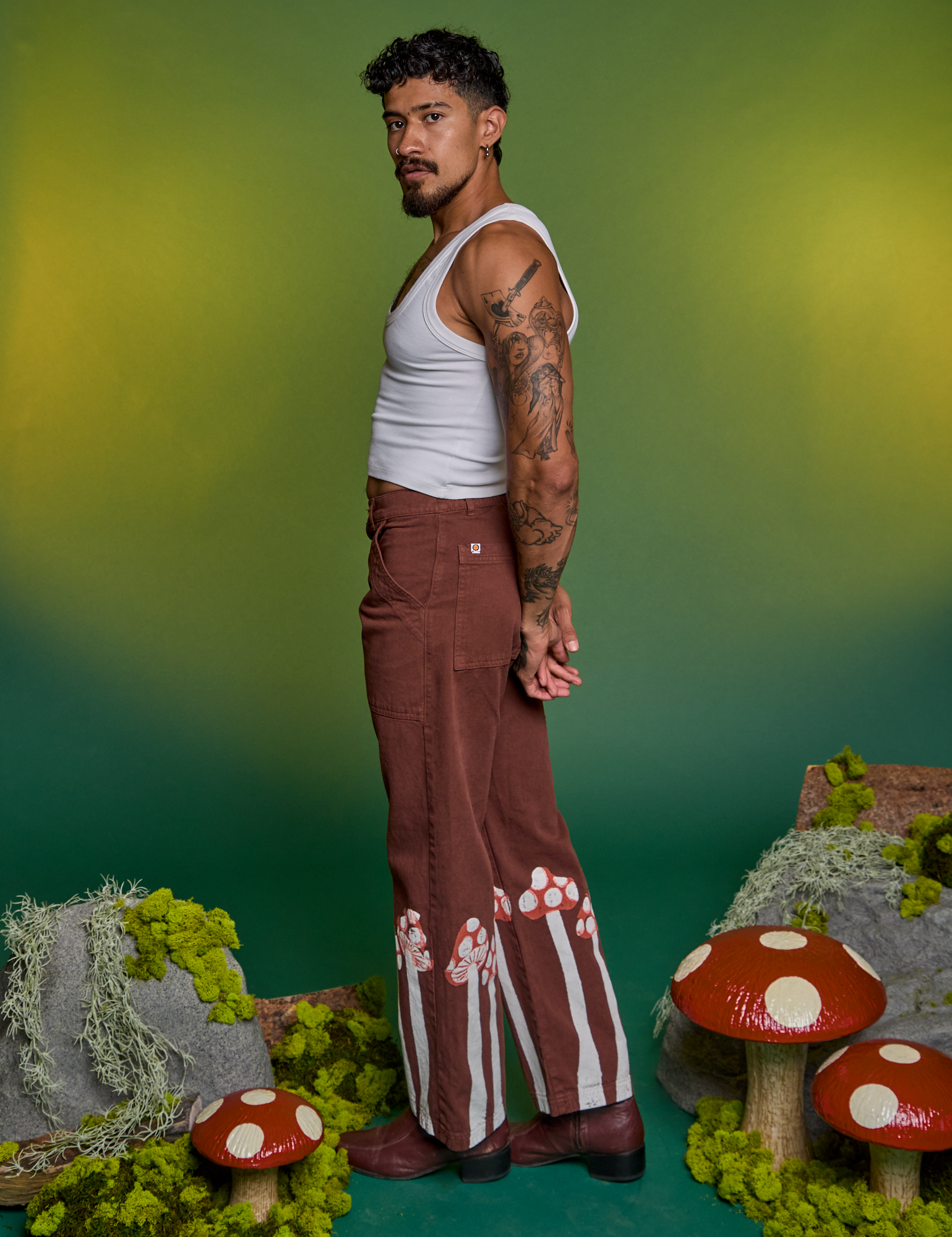 Side view of Paintstamped Work Pants in Mushroom and Cropped Tank in Vintage Tee White on Jesse