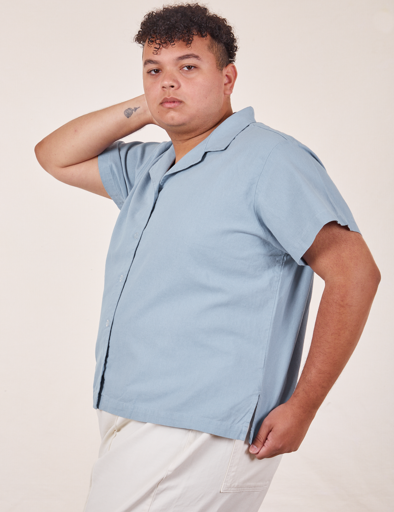 Side view of Pantry Button-Up in Periwinkle on Miguel