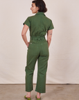 Petite Short Sleeve Jumpsuit in Dark Emerald Green back view on Soraya