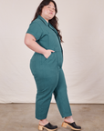 Petite Short Sleeve Jumpsuit in Marine Blue side view on Ashley