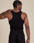 Racerback Tank in Black back view on Isaac